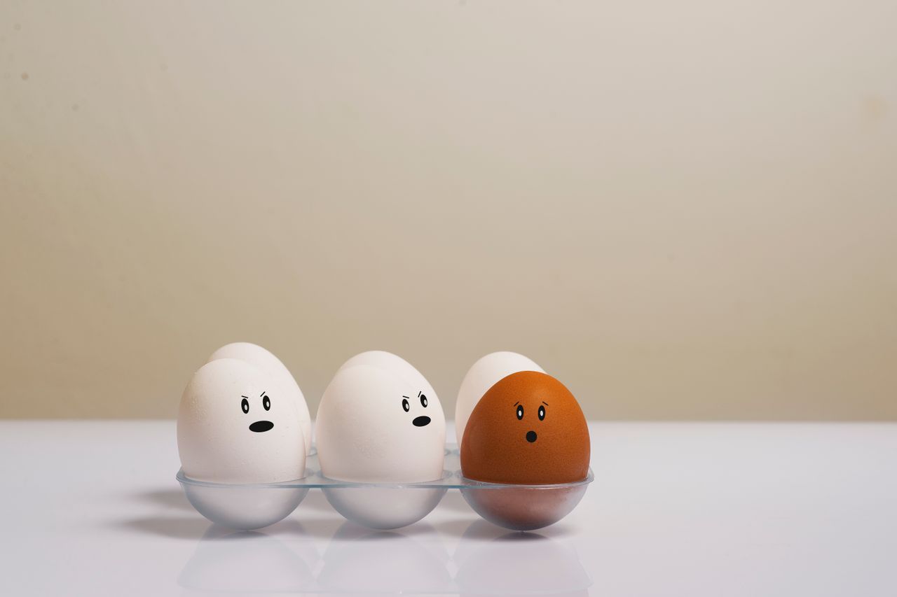 Eggs spread across several baskets, illustrating investment diversification