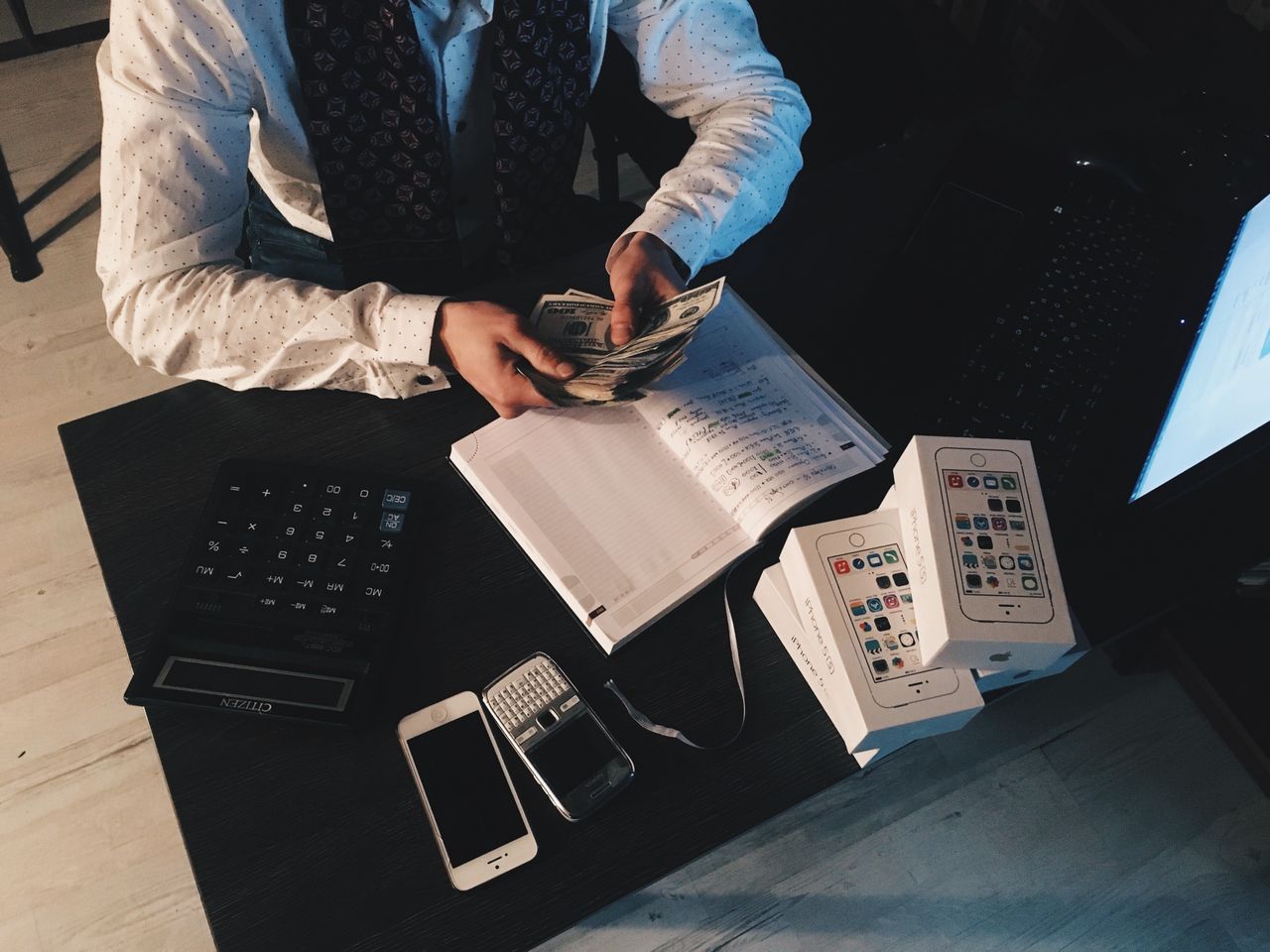 A checking account card and a savings jar side by side, representing the two account types