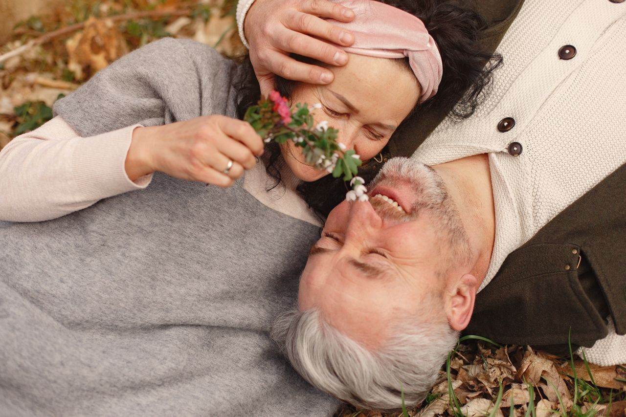 Happy senior couple outdoors, the retirement years the savings are for