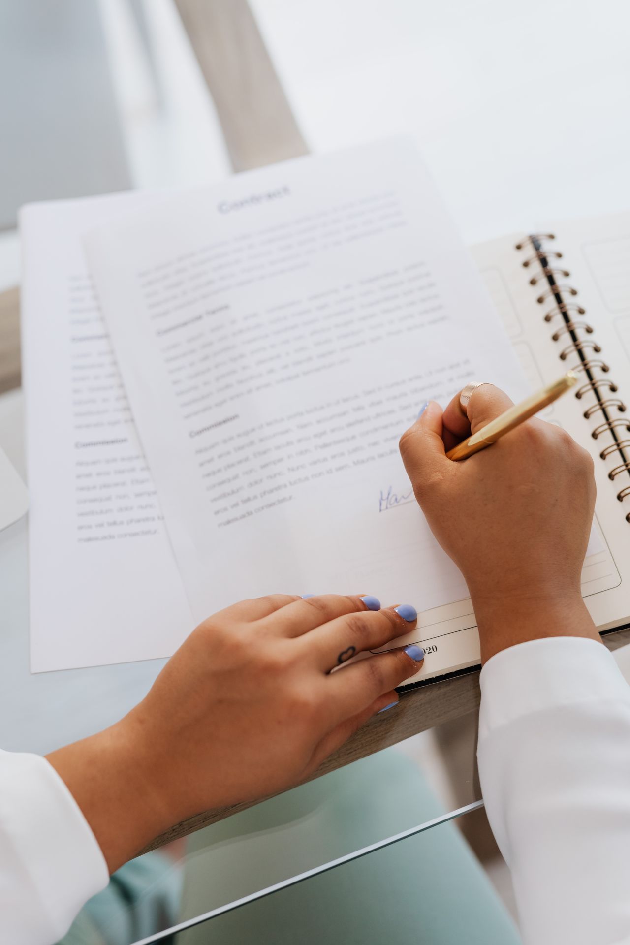 Reviewing consolidation loan paperwork before rolling debts into one