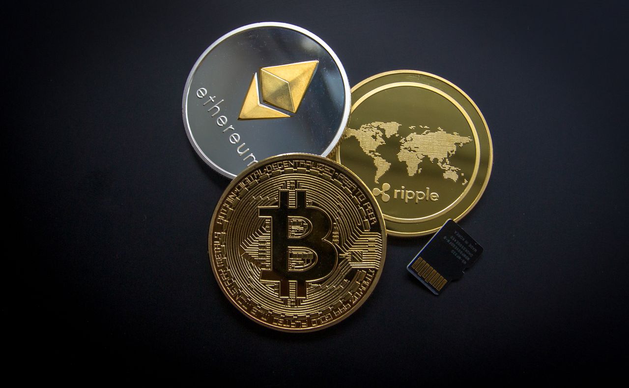 Physical bitcoin coin representing a cryptocurrency market rally